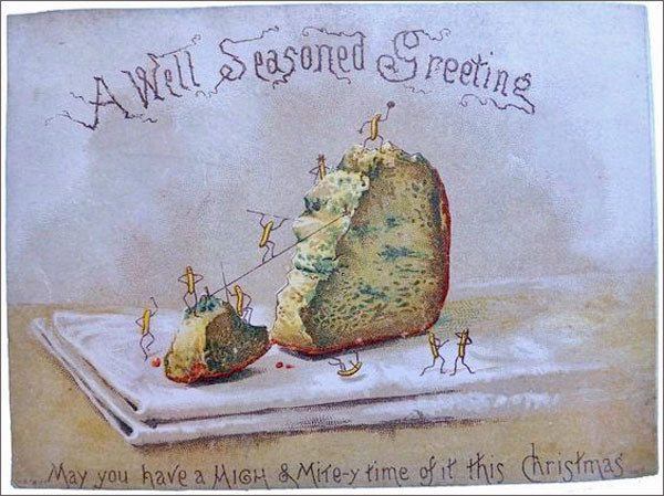 Christmas card with a piece of moldy cheese on it